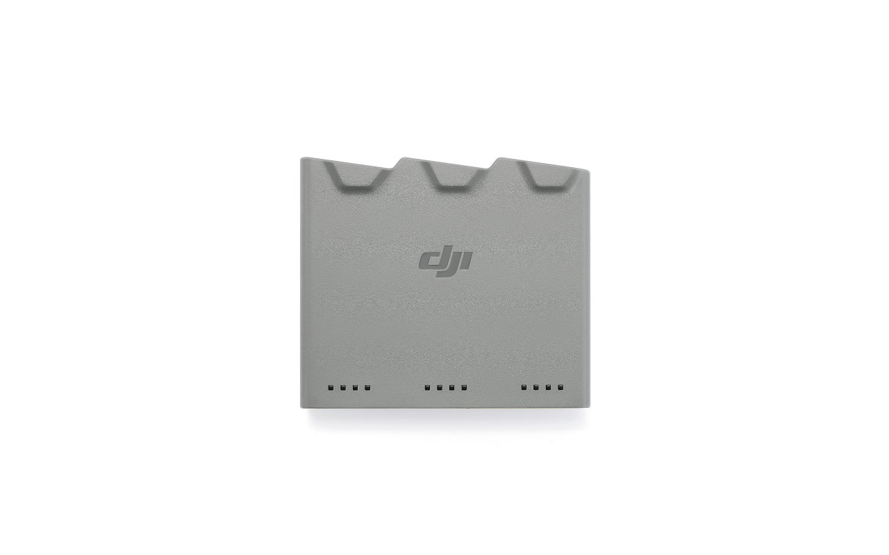 Auf dem Bild ist die DJI Mini 5 Pro Zweiwege-Ladestation in der Frontansicht zu sehen.